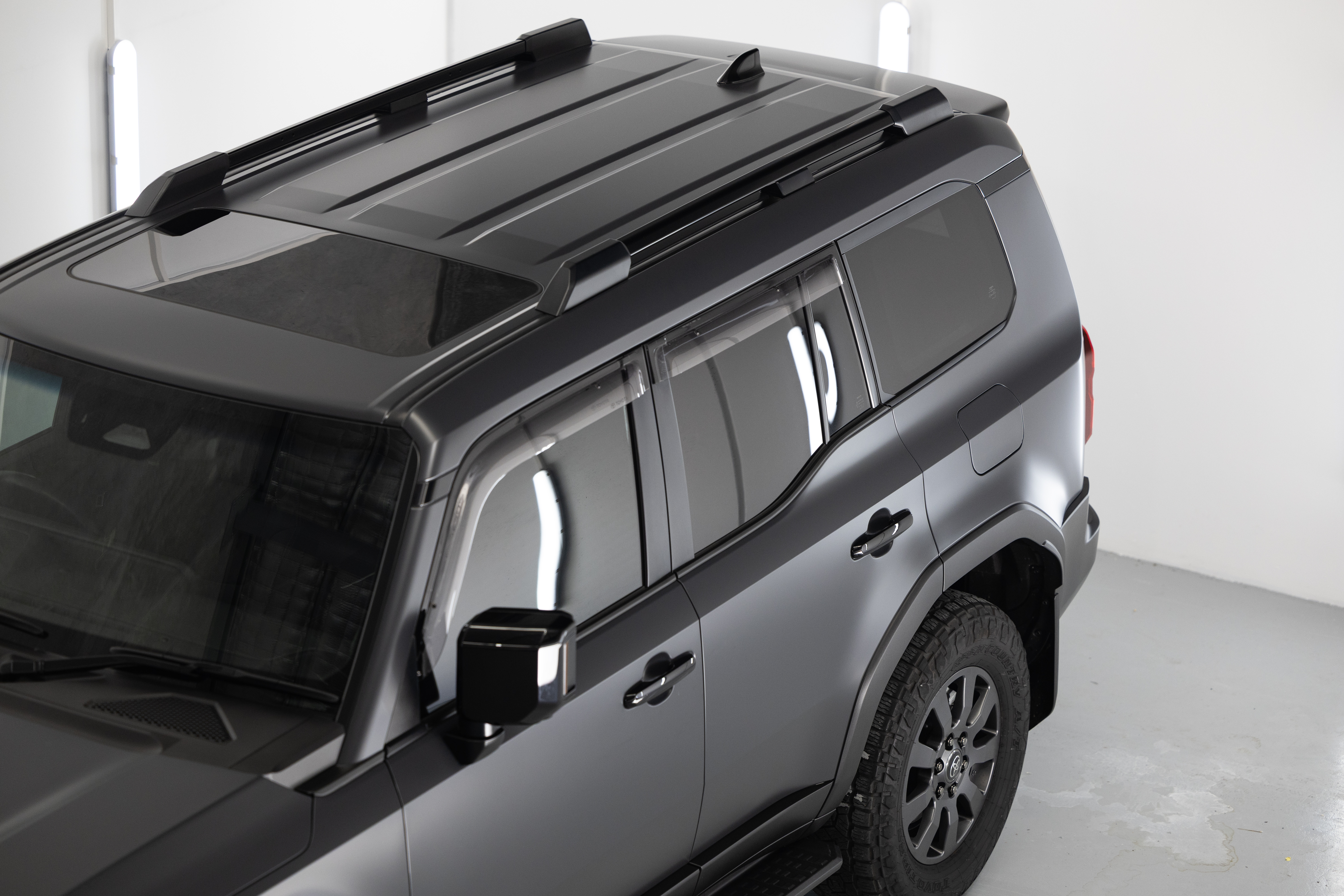 Top view of Prado 250 roof and upper glass with satin Stealth finish (ceramic over PPF for easier washing)